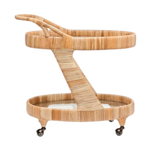 The Lulu Retro Rattan Bar Cart by Made Goods features two tiers with glass shelves, rounded edges, a curved handle, and four caster wheels for easy mobility.