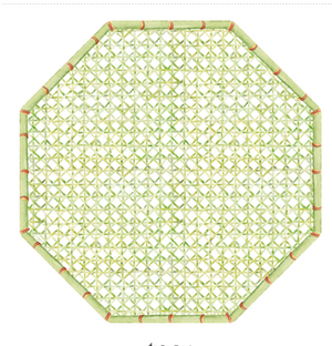 The Trellis Green Die Cut Placemat by Caspari is an octagonal woven mat made of green bamboo strips with red corner bindings, ideal for adding a unique touch to your tabletop décor.
