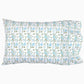 The Mihana Mist Bedding Collection by John Robshaw features a rectangular pillow with a white organic cotton cover, 400 thread count, and a blue-green floral pattern for botanical harmony and comfort.