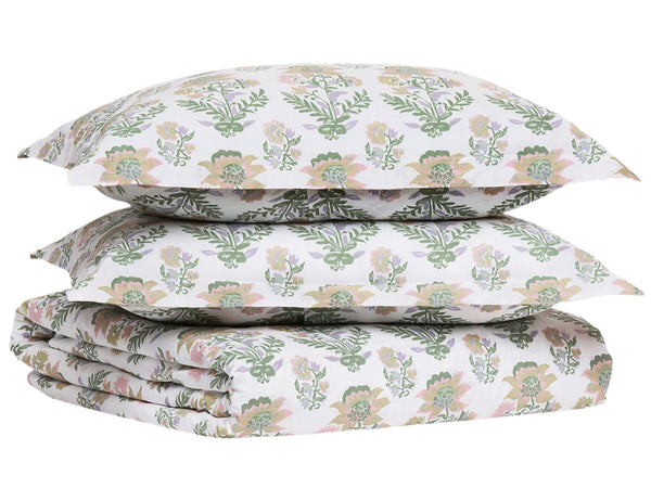 The John Robshaw Hina Duvet bedding set includes two pillows and a quilt with a green and pink floral design on a white background, all crafted from soft organic cotton.