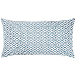 The Nalin Light Indigo Bolster by John Robshaw is a rectangular blue pillow with a white geometric pattern of repeating circular shapes, inspired by woven ikats.