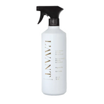 White L’Avant Collective Unscented Stain Remover spray bottle with a black trigger nozzle.