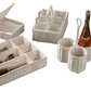The Micaela White Rattan Serveware Collection by Blue Pheasant features organizers for utensils, plates, glasses, and a wine bottle with cups—offering stylish practicality to any gathering.
