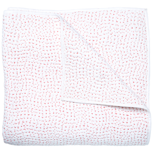 The John Robshaw Stitched Coverlet, Lotus, is a white cotton voile quilt made in India, featuring small red stitches and a corner flipped to reveal its artisanally hand-stitched underside.