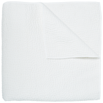The Stitched White Coverlet by John Robshaw, made in India from soft cotton voile with a subtle textured pattern, is neatly folded with one corner turned down and displayed on a plain white background.