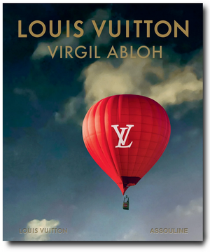 Book cover featuring a red hot air balloon with the Louis Vuitton logo against a cloudy sky. Text reads "Virgil Abloh" at the top, and "Louis Vuitton Virgil Abloh Ultimate Edition Assouline" at the bottom. This piece is part of the ultimate collection, celebrating timeless elegance and innovative design.