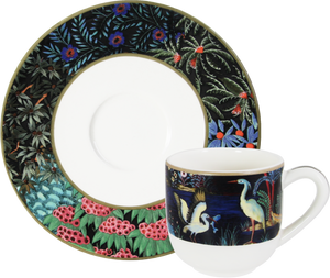 The Jardins Du Palais Espresso Cup and Saucer Set of 2 from Gien France features colorful botanical motifs and birds on a dark backdrop—ideal for serving espresso in style.