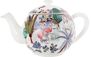 The Jardins Du Palais Teapot by Gien France is a white ceramic piece featuring vibrant illustrations of flamingos, trees, and exotic plants from the Le Jardin du Palais collection.
