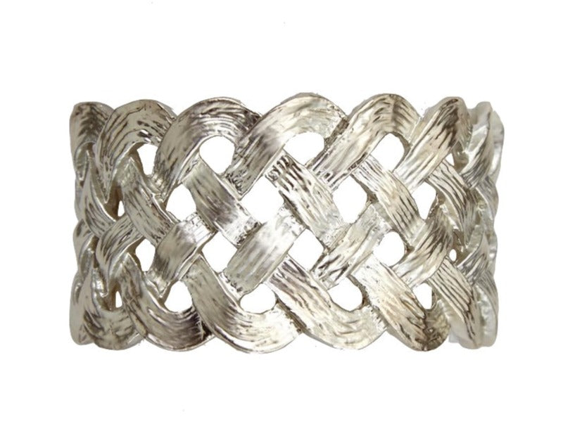 The Braid Napkin Jewels Platinum Set by L'Objet features a handcrafted, textured braided design in platinum—an elegant statement for any table and perfect for gifting in a luxury box.
