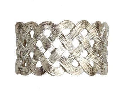 The Braid Napkin Jewels Platinum Set by L'Objet features a handcrafted, textured braided design in platinum—an elegant statement for any table and perfect for gifting in a luxury box.