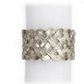 The Braid Napkin Jewels Platinum Set by L'Objet features handcrafted silver napkin rings with an intricate braided design, elegantly displayed around a white cloth napkin.