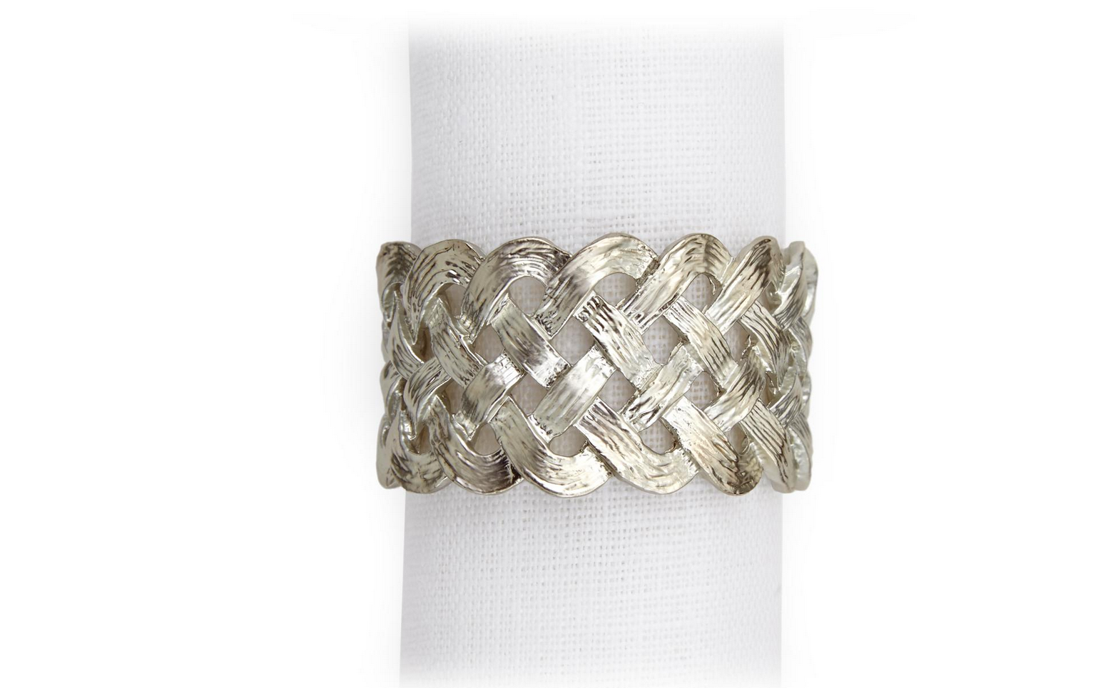 The Braid Napkin Jewels Platinum Set by L'Objet features handcrafted silver napkin rings with an intricate braided design, elegantly displayed around a white cloth napkin.