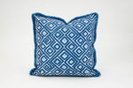 An Indigo Labyrinth Outdoor Pillow with a contrast trim, handmade in the USA by Edgar Custom Drapery.