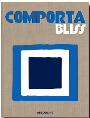 A book cover titled "Comporta Bliss" featuring abstract blue and white geometric shapes, reminiscent of the artistic community and beaches of Comporta. The publisher's name, Assouline, is at the bottom.