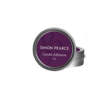 A container of Simon Pearce candle adhesive, 1 oz.