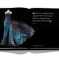 The Assouline book features a strapless gown with a colorful abstract pattern and a quote on storytelling in fashion, echoing Zuhair Murad's couture collections known for exquisite handcrafted beading.