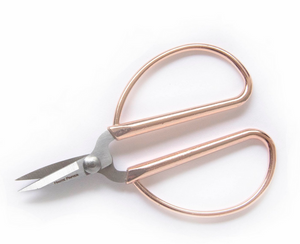 The Haute Papier Mini Rose Gold Scissors feature rose gold-colored handles and short, pointed stainless steel blades, displayed on a white background.