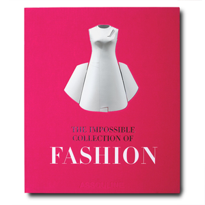 The cover of the book, "The Impossible Collection of Fashion" by Assouline, is set against a pink background and showcases an iconic white dress with sculptural elements, epitomizing the quintessential compilation of twentieth-century fashion.