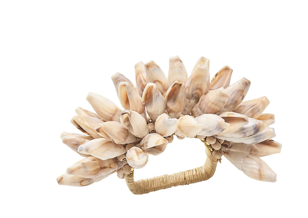 The Kim Seybert Shell Fringe Napkin Ring showcases multiple acrylic shells on a wrapped rectangular handle, making it ideal for a beach-inspired table setting.