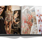 An open fashion magazine features backstage images of models adorned in Zuhair Murad's dresses, highlighted by Assouline, showcasing exquisite handcrafted beading.