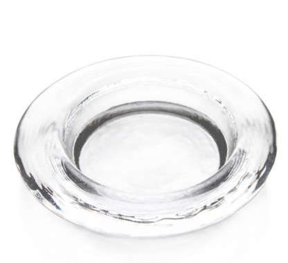 The Simon Pearce Hanover Glass Wine Coaster features a round, wide-rimmed design in crystal-clear glass, offering elegant table protection. Displayed on a white background.