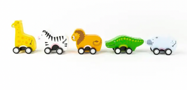 Five Jack Rabbit Creations Pull Back Safari Creatures on wheels in a row, depicting a giraffe, zebra, lion, crocodile, and whale, each with a cartoon-like design.
