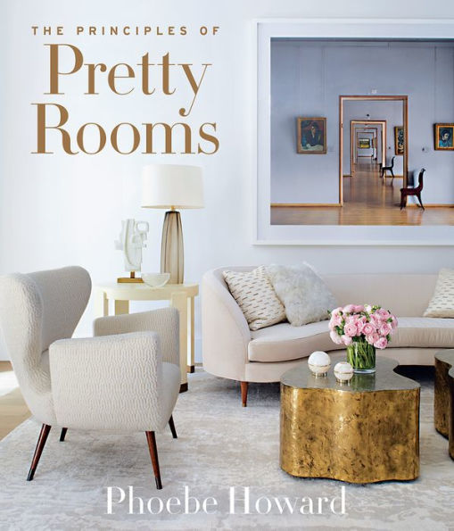 Cover of Abrams' "The Principles of Pretty Rooms" by Phoebe Howard, featuring a stylish living room with a sofa, armchairs, a gold table, and artwork exemplifying timeless interiors.