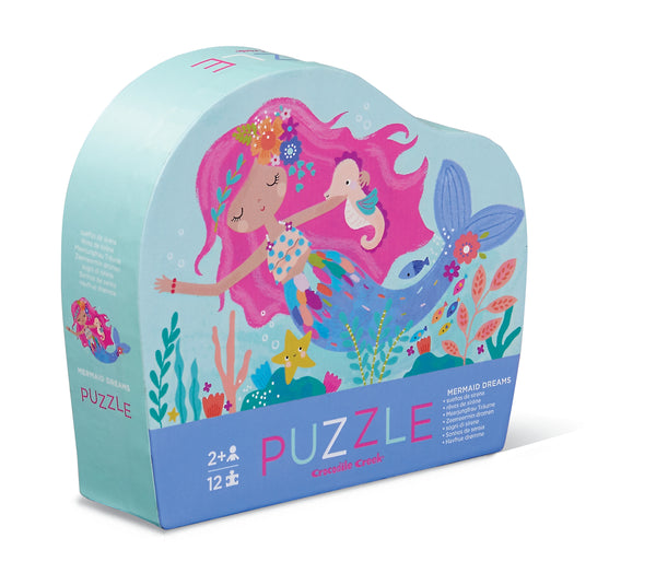Crocodile Creek Illustrated children's jigsaw puzzle box featuring a mermaid theme with colorful underwater imagery.