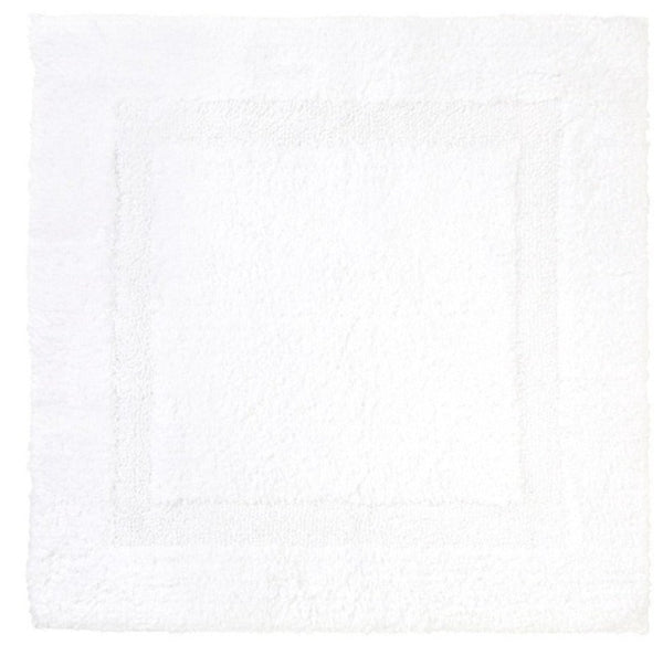 A Yves Delorme Aquilon Bathmat Collection - Blanc on a white background.