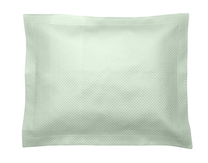 The Alba Bedding Collection Opal pillow by Matouk features a square, textured light green design with a subtle pattern in OEKO-TEX® certified fabric, shown against a white background.