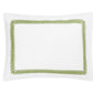 An embroidered Matouk Astor Braid Bedding Collection, Grass pillow with green trim.
