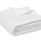 A neatly folded Matouk Basketweave Bedding Collection, White with a subtle woven pattern in a diamond design, crafted from luxurious Egyptian cotton sateen.