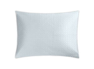 A decorative pillow from the Matouk Basketweave Bedding Collection in 'Pool' color showcases a light blue, textured geometric basketweave pattern on a white background, crafted from Egyptian cotton sateen.