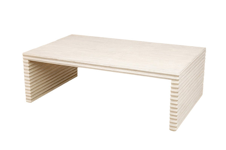 The Mr Brown Belmont Coffee Table features a slatted top and hand-carved legs, all in a stunning white rustic pine finish.
