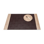 The Merida Natural Blotter Set by Pigeon & Poodle includes a rectangular buntal-covered placemat with beige edges, a dark brown center, and a matching round coaster—ideal for elevating your workspace.