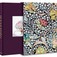 A photo of a luxury jewelry book with a cover featuring intricate designs of exceptional gemstones and pearls, showcasing the artistry of Assouline jewelers. The book's spine reads "BOGHOSSIAN" and highlights their cross-cultural influences in every detail.