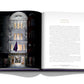 An open book displaying a lit-up building entrance on the left page and text on the right page with the heading "FOREWORD" at the top, reflecting cross-cultural influences akin to those seen in Assouline's Boghossian.