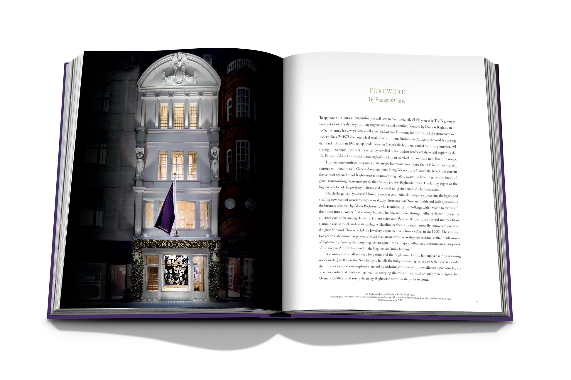 An open book displaying a lit-up building entrance on the left page and text on the right page with the heading "FOREWORD" at the top, reflecting cross-cultural influences akin to those seen in Assouline's Boghossian.