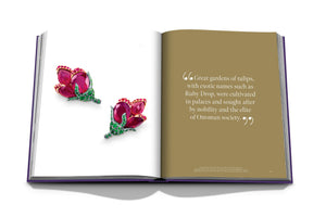 Open book displaying two pages; left page shows two exceptional gemstone brooches from Assouline jewelers, shaped like flowers with ruby and green stones. The right page contains a block of text with a quote about exotic tulips in Ottoman society, highlighting cross-cultural influences.