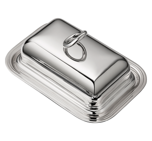 The Christofle Vertigo Butter Dish, with a rectangular silver-plated design and rounded lid and handle, sits on a matching tray in this photo against a white background.
