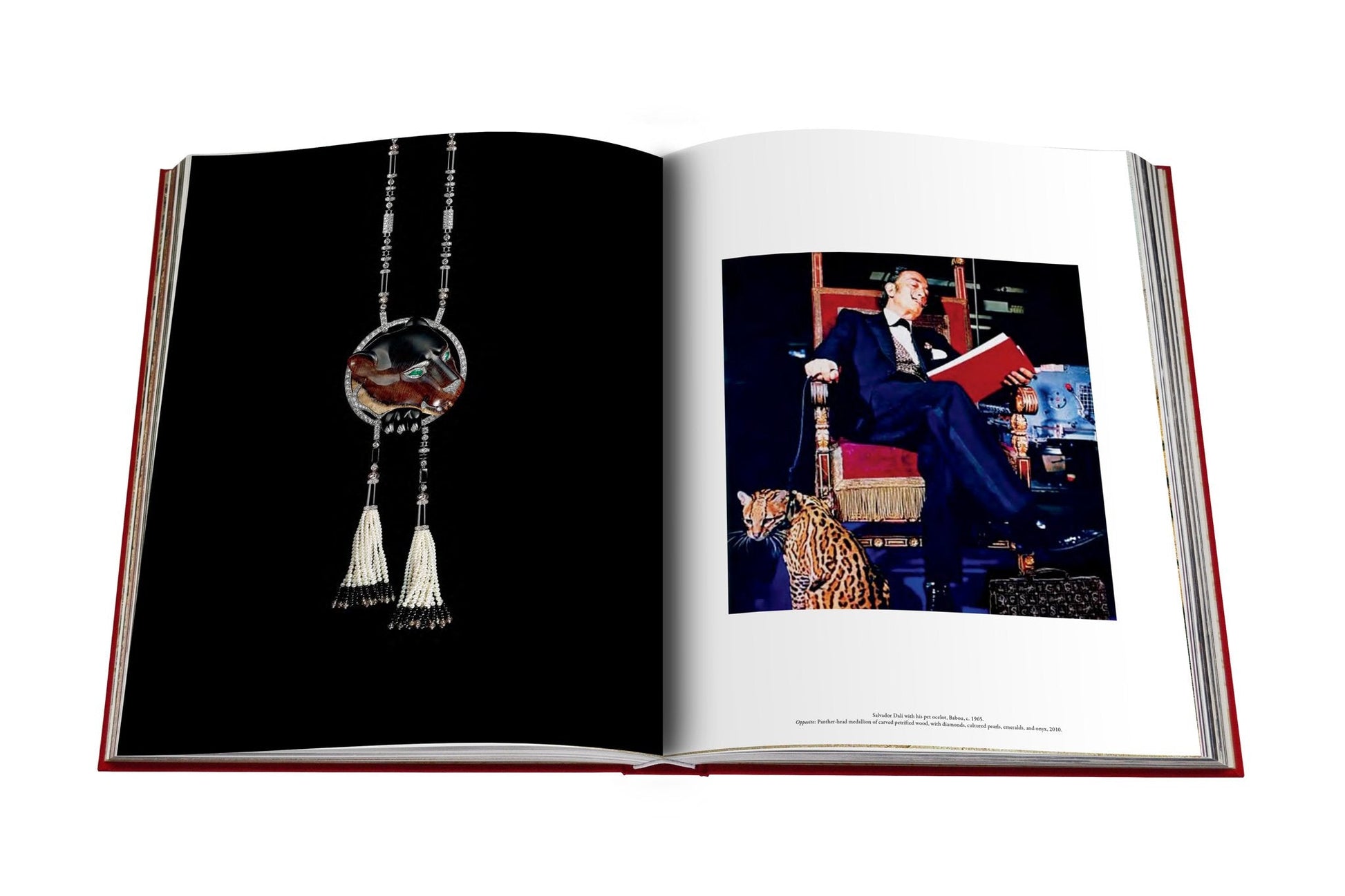 An open book showcases a necklace on the left page, representing modern femininity, while on the right page, a man is seated with a book beside an exquisite Cartier Panthere statue crafted by Assouline.