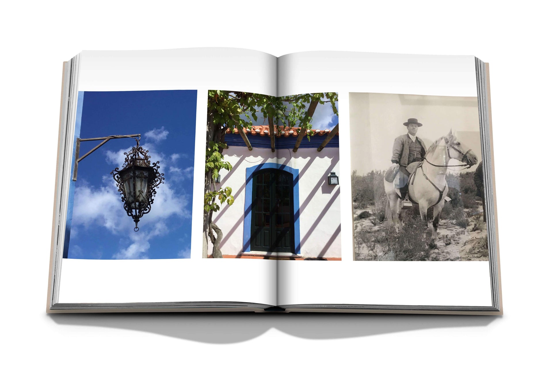 An open book displaying three images: a street lamp against a blue sky, a house with a blue door and window adorned with vines, and a vintage photo of a person on a horse. Each scene captures the essence of Comporta's artistic community near its serene beaches in "Comporta Bliss" by Assouline.