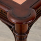 A close up of a Kindel Regency card table with a marble top.