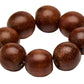 The Cocoa Wood Bracelet Napkin Ring Set by Deborah Rhodes features seven polished brown wood beads with small holes, creating an elegant accessory perfect for stylish place settings.