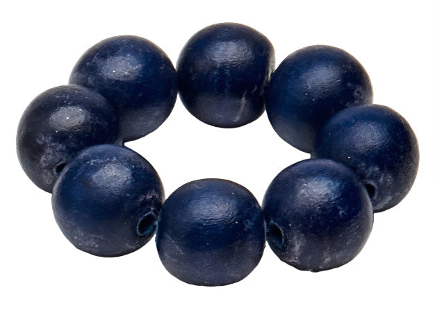 The Deborah Rhodes Cocoa Wood Bracelet Napkin Ring Set features eight round, dark blue wooden beads in a closed circle—an elegant accent for stylish table settings.