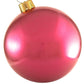 The Holiball Giant Inflatable Ornament by Holiball, featuring a glossy cranberry hue and a gold cap that evokes the charm of traditional holiday decorations, is presented against a white backdrop.