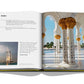 A Travel by Design book featuring a photograph of the Burj Khalifa by Assouline.