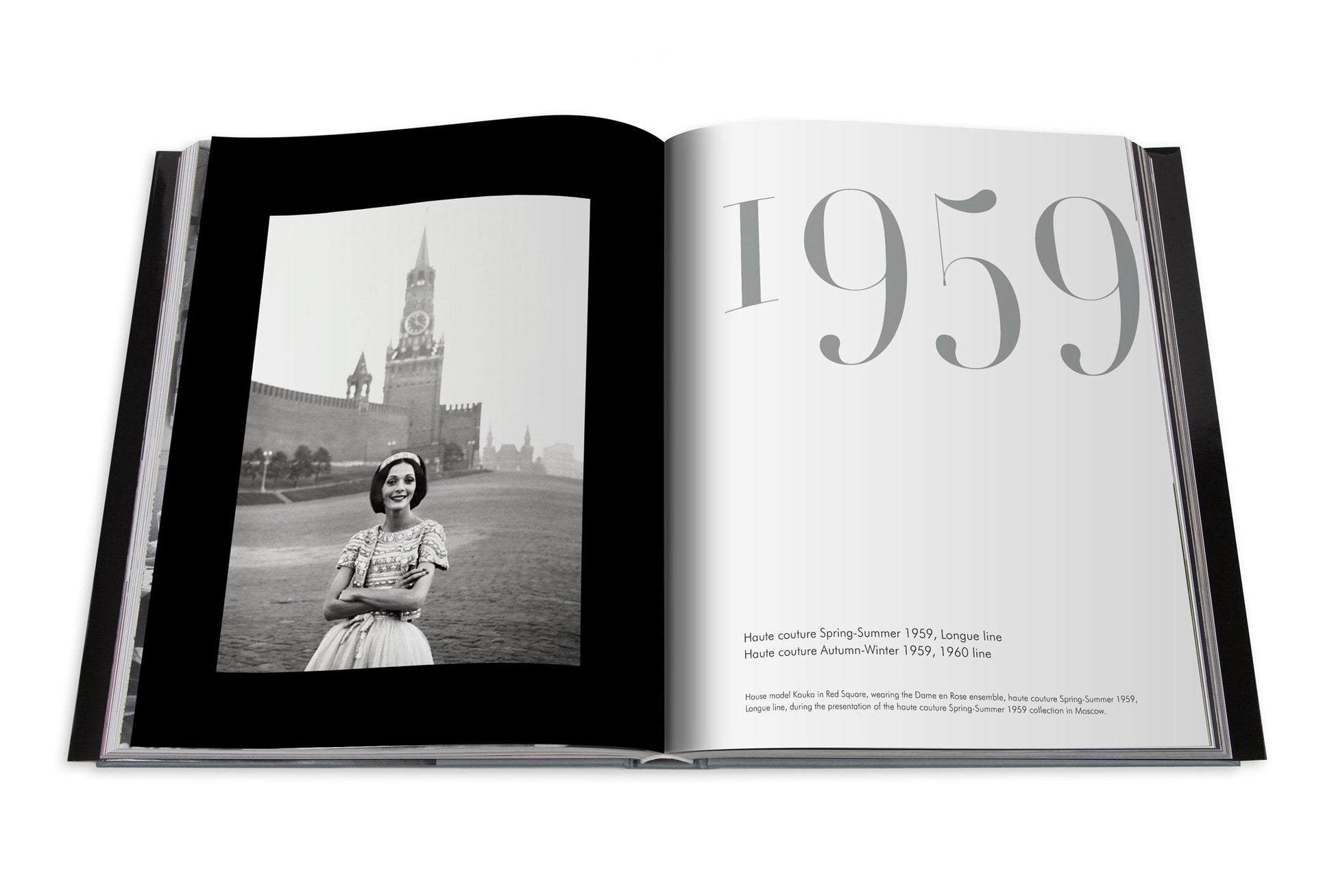 Open book showing a black-and-white photograph of a smiling woman in front of a clock tower on the left page, and the year "1959" with text about Assouline's Dior II by YSL on the right page.