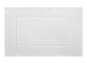 The Yves Delorme Eden Bath Mat Collection in Blanc features a white rectangular mat made from 100% cotton, highlighted by a textured border and central panel with a delicate French knot design.