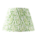 The Feather Ikat Shade in Spearmint by Sorella Glenn features a pleated green and gray ikat pattern, shown against a plain white background.